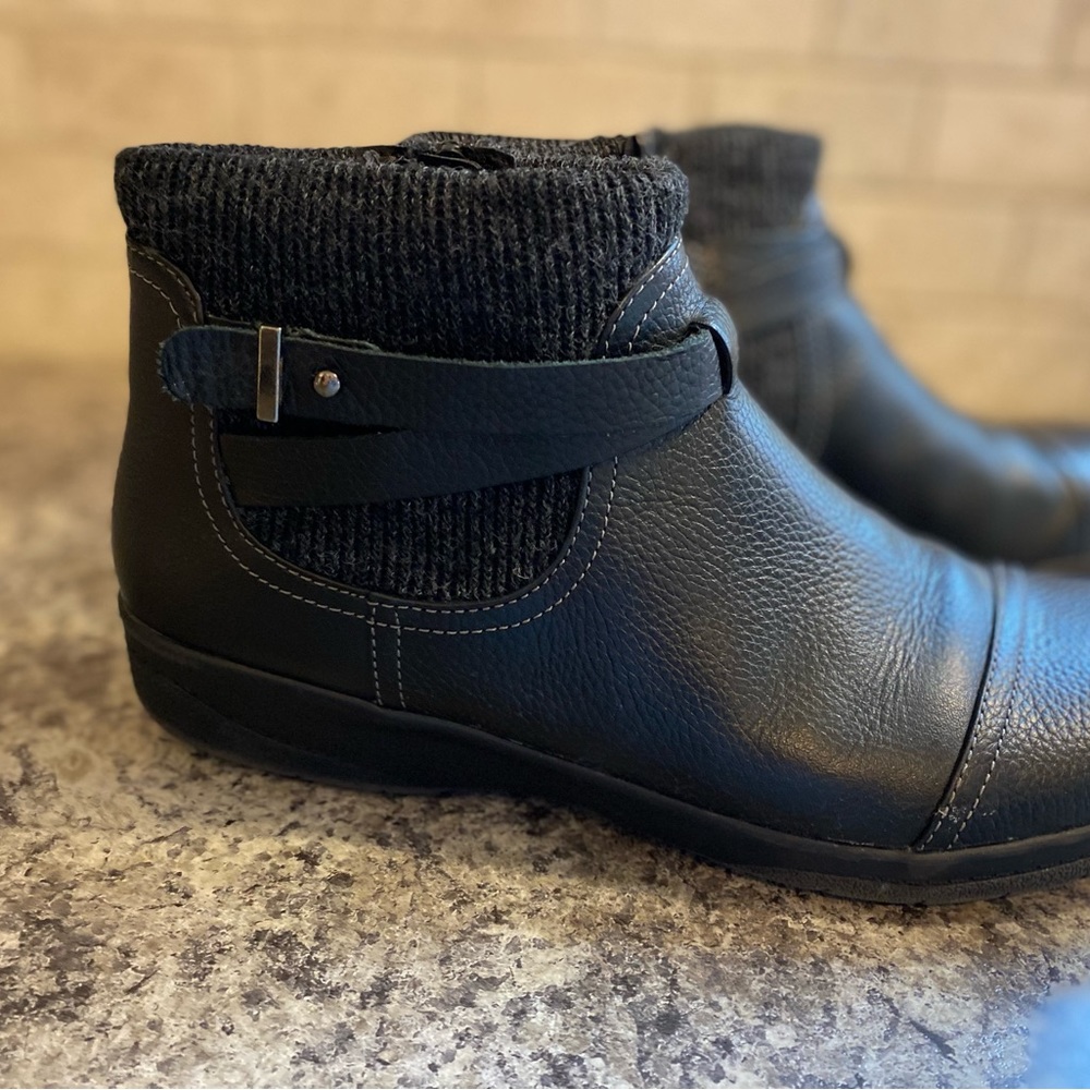 Clarks Cheyn Kisha black leather side zip boots. Sweater top. Size 10 woman’s
